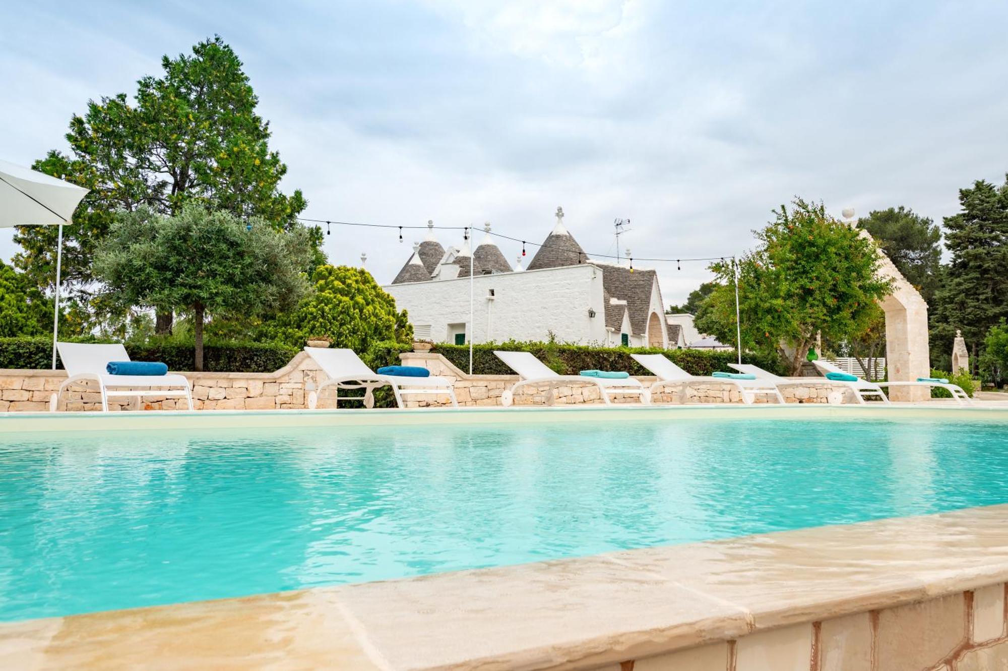Trullo Degli Anelli In Masseria Cisternino Bagian luar foto