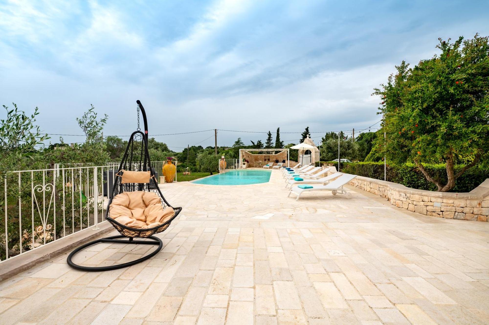 Trullo Degli Anelli In Masseria Cisternino Bagian luar foto