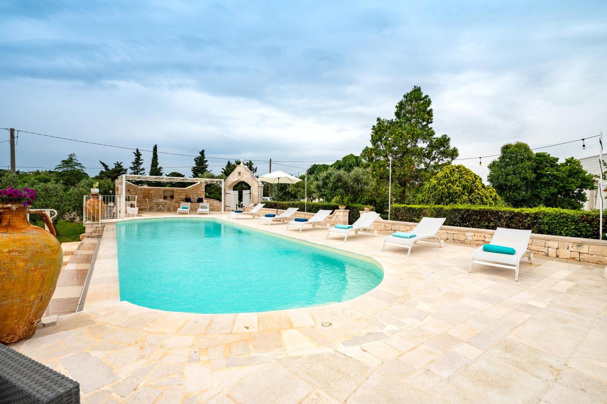 Trullo Degli Anelli In Masseria Cisternino Bagian luar foto